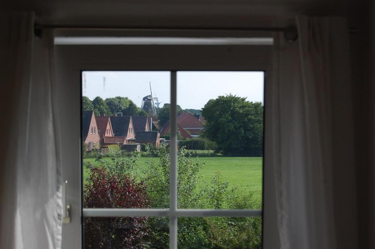 Ferienwohnung Im Gulfhof Krummhörn Buitenkant foto